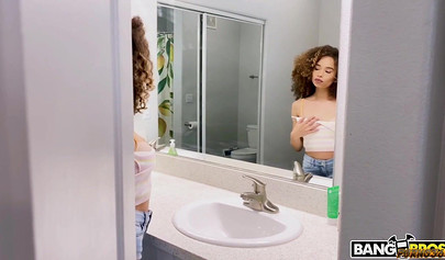 Curly ebony spreads her legs wide and takes a cock inside