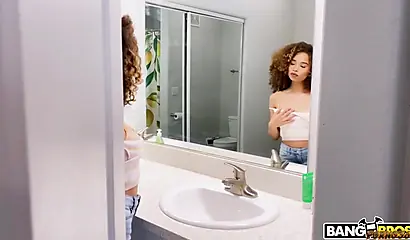 Curly ebony spreads her legs wide and takes a cock inside