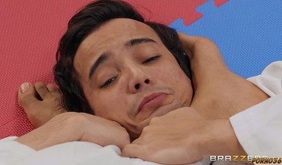 Adorable black beauty is giving footjob at a karate lesson