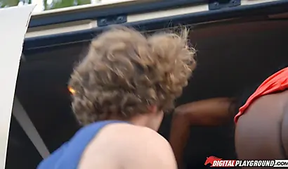 Lustful ebony has fun with a curly-haired guy in a car salon