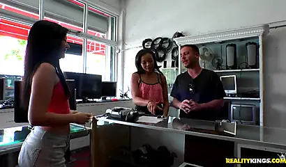 Sexy shopgirls share a manager's dick in the storeroom