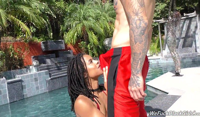 Naughty ebony with African pigtails gets her ass banged