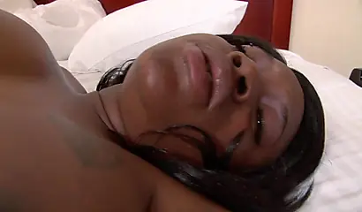 Pregnant ebony in fishnets having some good sex on the bed