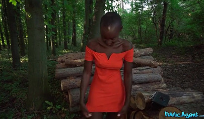 Amateur ebony is sucking a thick white cock in the woods