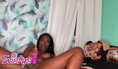 Horny ebony Daya Knight satisfies herself with a pink dildo