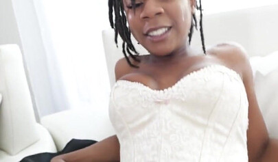 Horny ebony babe is giving titjob and getting drilled